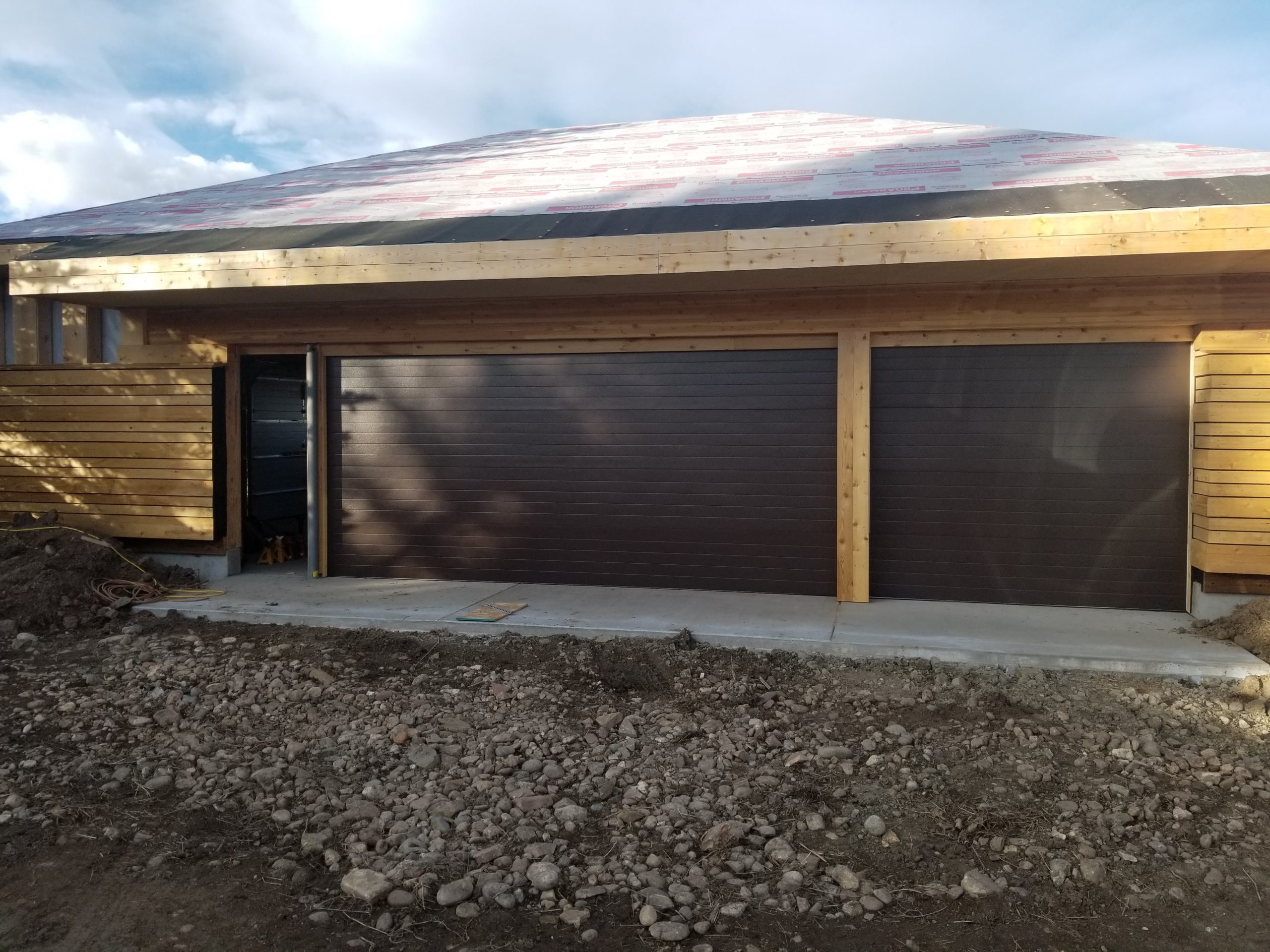 Triple Garage Door Installation in New Home in Boulder, CO